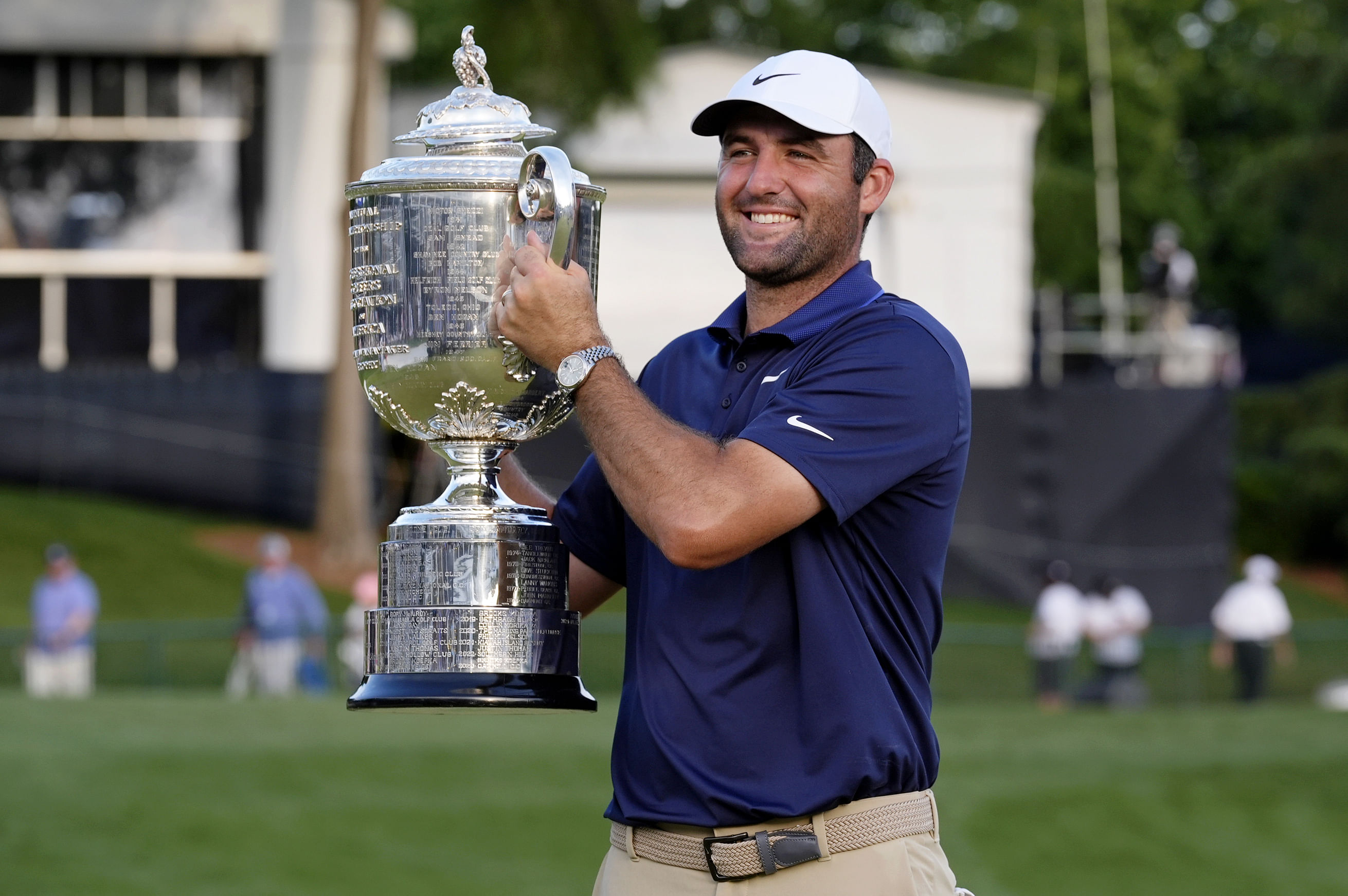 World No. 1 golfer Scottie Scheffler lifts the Wanamaker Trophy after winning the 2025 PGA Championship - Final Round - Image Source: Imagn